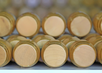 Wine barrels stacked in the cellar of the winery