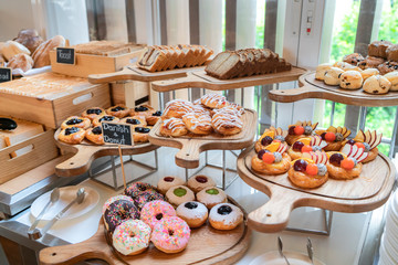 A variety of freshly made pastry in breakfast buffet at luxury hotel.
