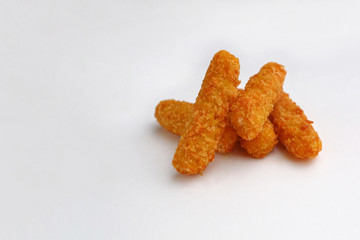 a dish for beer with a different snack on a wooden table