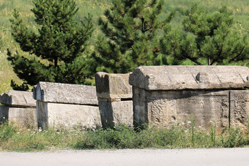 Naklejka premium Stone tombs in field