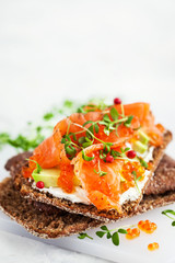 Salted salmon, red caviar, avocado and cream cheese rye crisp toast