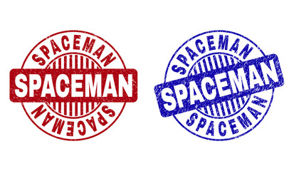 Grunge SPACEMAN round stamp seals isolated on a white background. Round seals with grunge texture in red and blue colors. Vector rubber overlay of SPACEMAN title inside circle form with stripes.