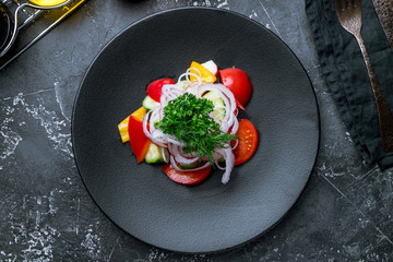 Vegetable salad with tomatoes and cucumbers