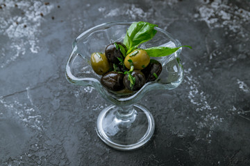Kalamata olives on wooden table
