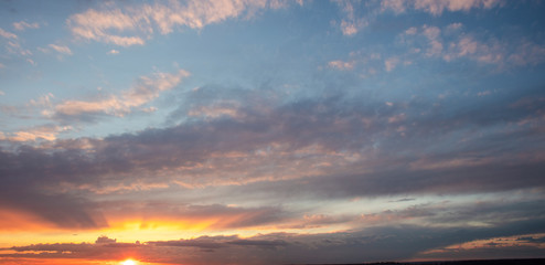Panorama with a beautiful sunset. Sunset sky. Landscape.