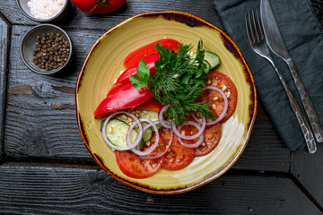 Vegetable salad with tomatoes and cucumbers