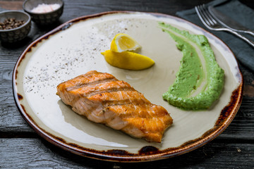 Salmon steak on the grill