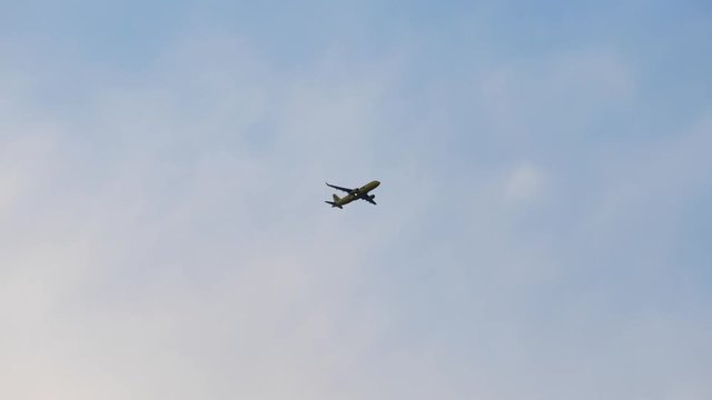 Passenger Airplane Flying Across the Sky in 4K