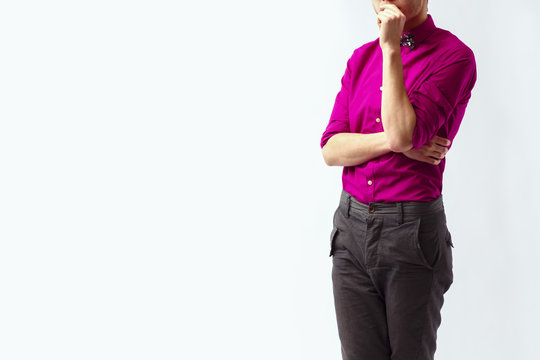 Young handsome man over isolated background with hand on chin thinking about question, pensive expression. Doubt concept. Copy space for text.