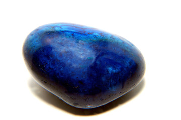 blue stone on a white background close-up with texture