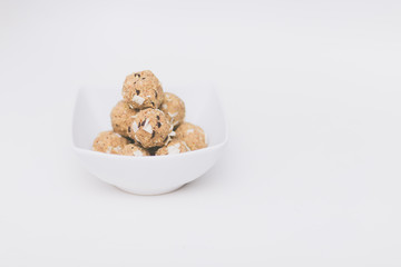cookie dough balls in white bowl