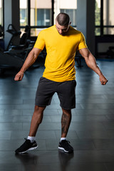 Fototapeta na wymiar Healthy Man Posing In Yellow T-shirt