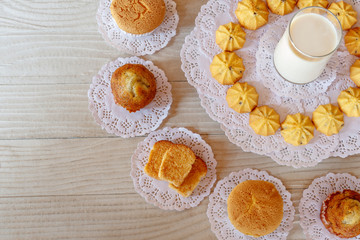 Obraz na płótnie Canvas Milk, Cupcake, Cake Roll, Garlic Bread, Butter Bread, Banana Cupcake and Cookie