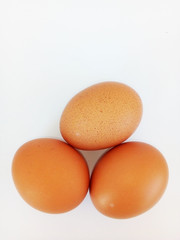three eggs isolated on white background