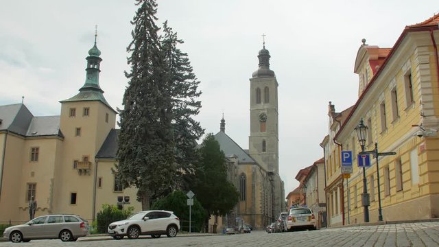 amazing traditional central european architecture and modern parked cars