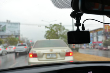 video camera recorder inside car driving rainy day