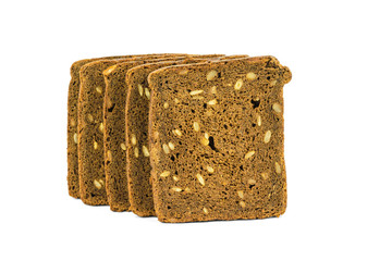Five pieces of coarse-milled bread isolated on white.