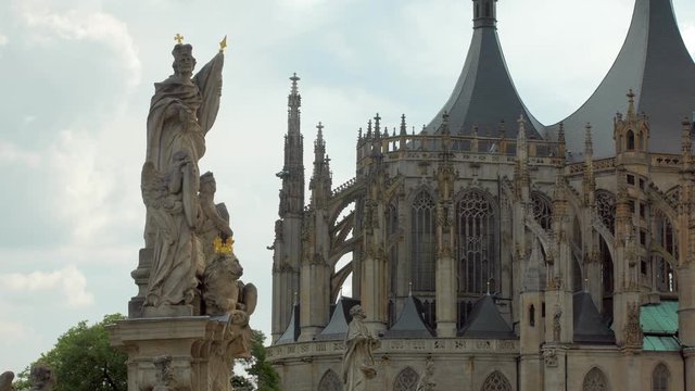 amazing gothic architecture of old cathedral and medieval statutes in czech city