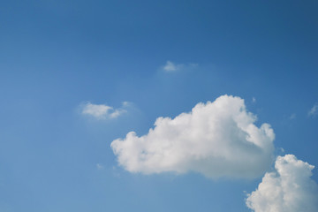 Naklejka na ściany i meble fluffy white cloud on clear blue sky