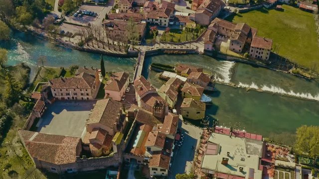 Drone shot over Valeggio sul Mincio bridge Mantova Italy