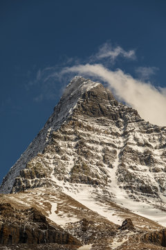 Mount Robson Peak with snow and cloud