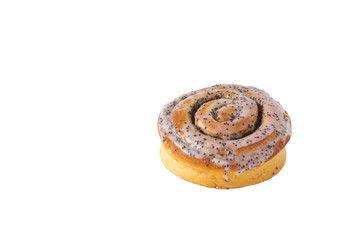 fresh baked yellow brown bun with cream and poppy seeds closeup isolated on white background