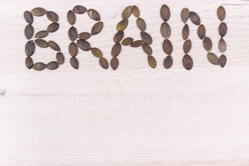 Inscription brain with place for text on white board, brain health concept