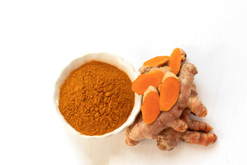 curcuma longa and powder isolated on white background