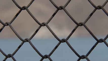 Metal fence on a blurred background