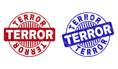 Grunge TERROR round stamp seals isolated on a white background. Round seals with distress texture in red and blue colors. Vector rubber imitation of TERROR label inside circle form with stripes.
