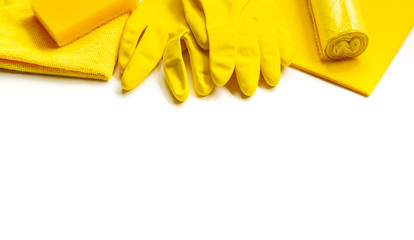 Yellow set for bright spring cleaning in the house. The concept of spring. Copy space.