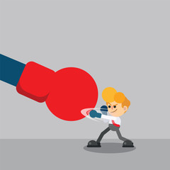 Businessman punch with a big red boxing glove
