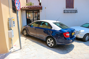 Thessaloniki classic blue and white taxi car on the street