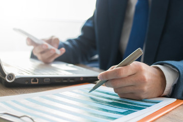 hand of business man writing in the office