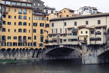 Fototapeta na wymiar Ponte Vecchio famous landmark in Firenze, building side detail