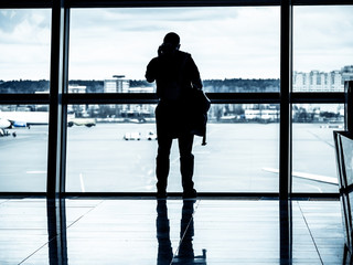 Fototapeta premium Phone call from an airport