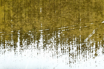 Agricultural field appears from under the snow. View from the drone
