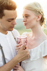 Beautiful portrait of man and women in lavender field