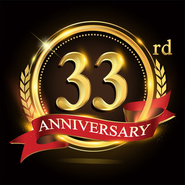33rd golden anniversary logo, with shiny ring and red ribbon, laurel wreath isolated on black background, vector design for birthday celebration.