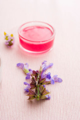 Creams on pink textile