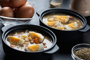 The sour soup made of rye flour with eggs