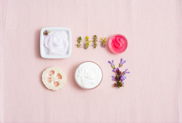 Creams on pink textile