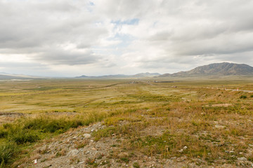 Fototapeta premium Mongolian Landscape of Orkhon Valley, Mongolian steppe with grassland, highway and railroad