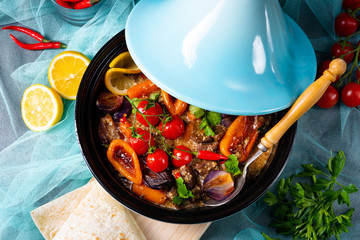 Tasty spicy beef with various vegetables cooked in tagine