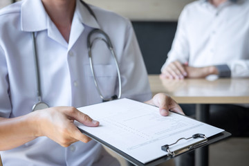 Doctor in white uniform gown coat and unhappy patient discussing consults explaining to treatment disease symptom and making prescriptions in hospital, healthcare and medical concept