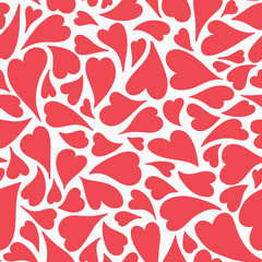 Hand drawn red tossed hearts in a seamless repeat vector pattern. A romantic print pattern ideal for valentines and wedding projects.