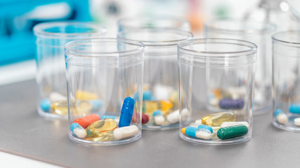 Pills in a Disposable Plastic Cup