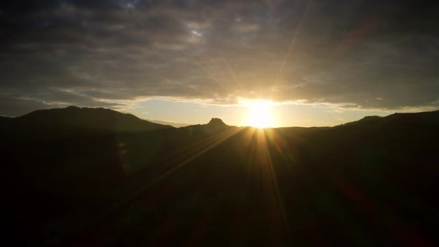 Backlighted sunset. Drone hyperlapse , Italians hills.
