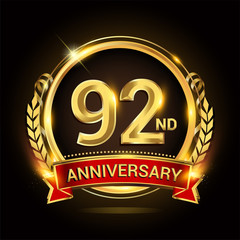 92nd golden anniversary logo, with shiny ring and red ribbon, laurel wreath isolated on black background, vector design