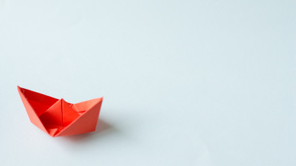 Red paper ship with copy space.Idea Concept.